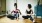 two women sitting on the floor